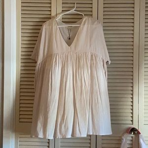 Pale pink baby doll dress